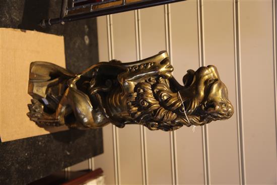 A.W.N. Pugin for Alton Towers. A pair of heavy gilt bronze fire dogs modelled as lions triumphant, c. 1840-50, height 19in.